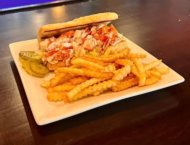 Lobster roll with crinkle fries